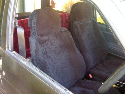 the contrast between the second hand black sheepskins and the red rug over the back seat really set the tone for the interior...