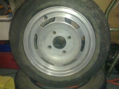 these are 12in samson rims, my dad reckons they came off a datsun 1200<br />they will go on when i have money to get the right wheel nuts
